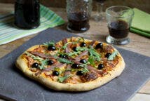 Pizza de anchoas y rúcula